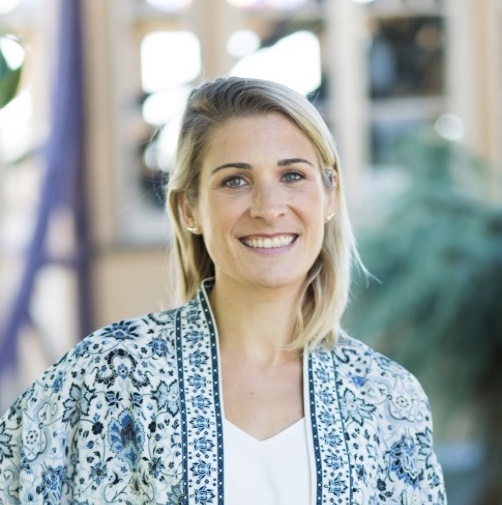 woman with blond hair smiling