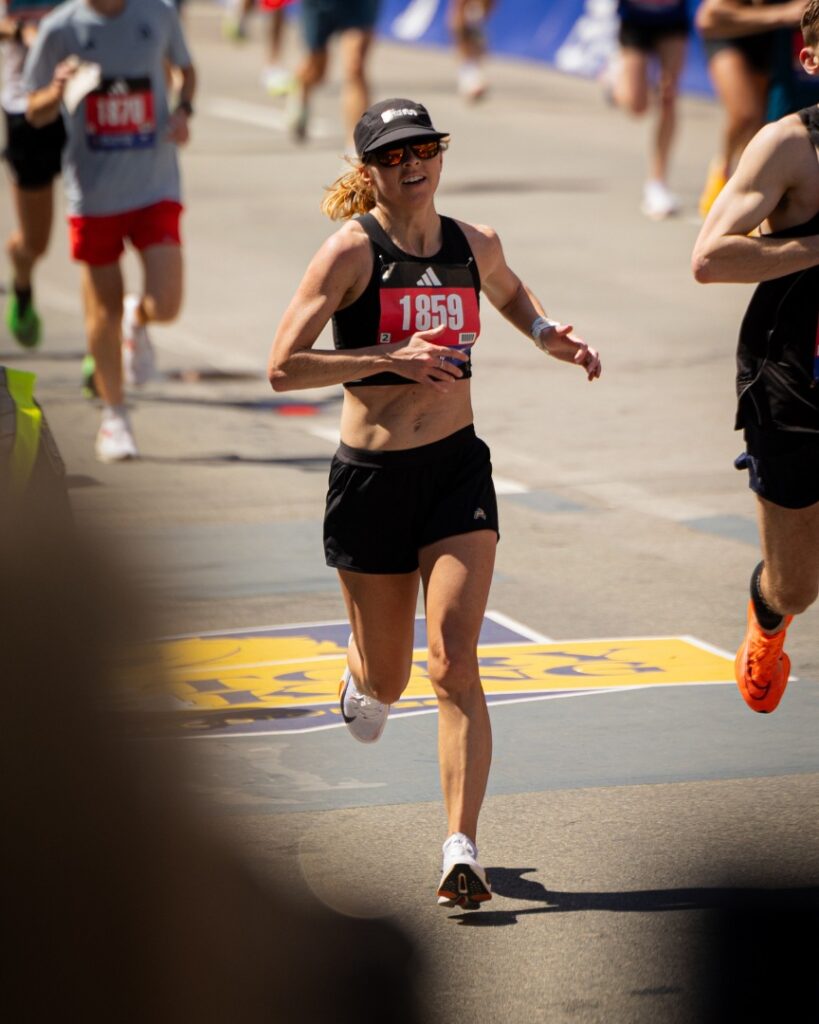 boston marathon - meg finishing vertical