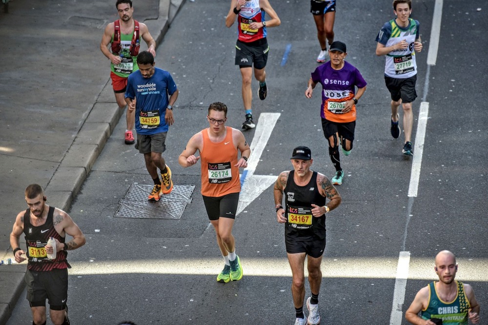 runners running down the street