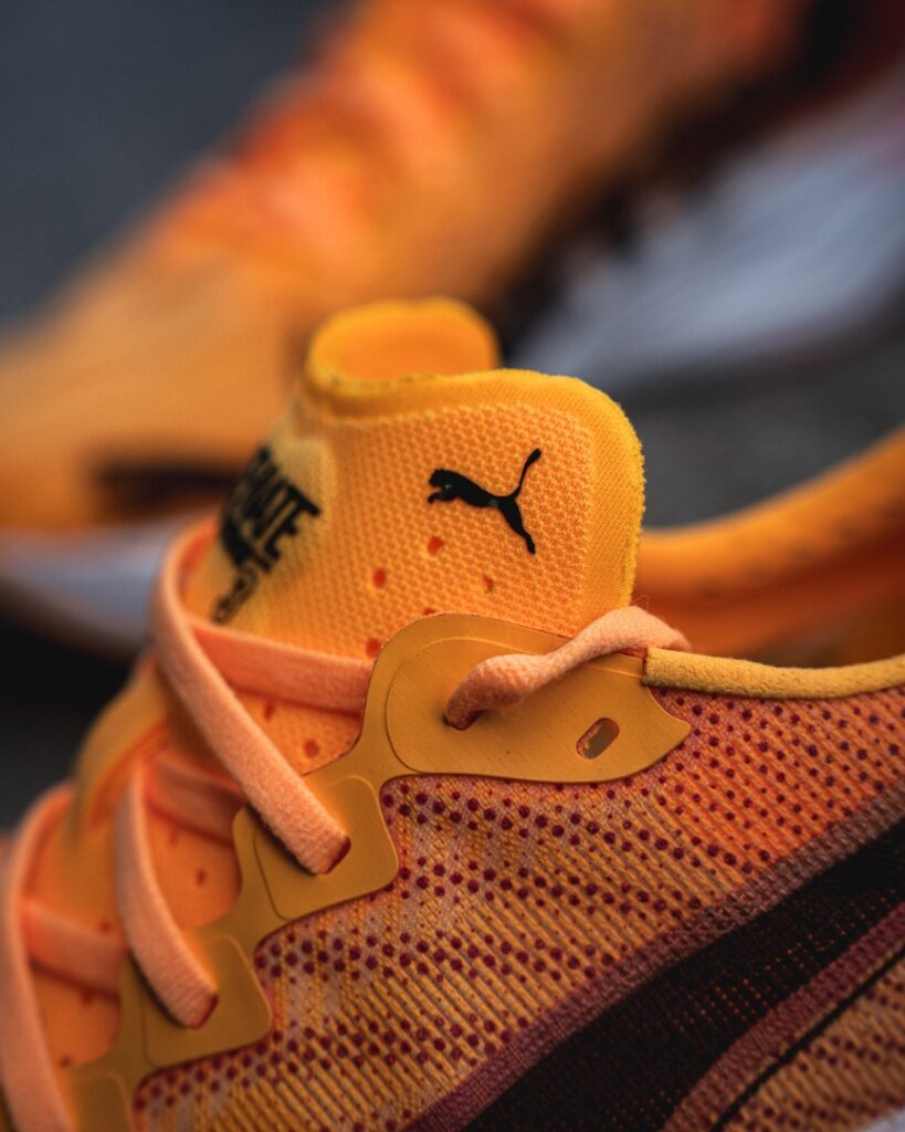 puma deviate nitro elite 3 - tongue logo