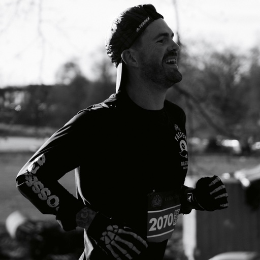 man running and smiling